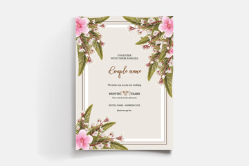 WEDDING INVITATION FRAME WITH FLOWER DECORATIONS AND FRESH LEAVES