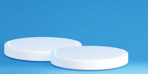 Two clean white round podiums of different heights on a vibrant blue surface and background. Ideal for showcasing multiple products in a modern display.