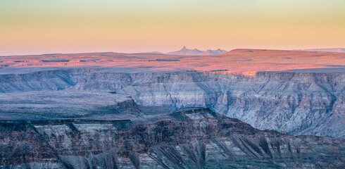 Sunrise over the plateau with Fish River Canyon in south Namibia. 