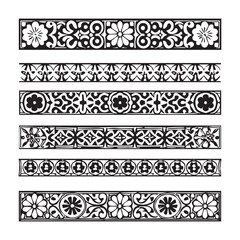 A vector illustration of a set of intricate black-and-white decorative dividers.  © shahariea