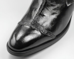 Elegant black ankle boots paired with slim-fit trousers Suitable for a formal or semi-formal event - boots and casual footwear leather