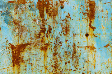 Rusty corroded turquoise painted metal sheet