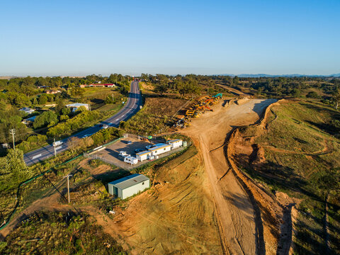 Worksite buildings and Machinery ready to continue construction on bypass road