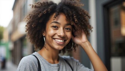 Fototapeta premium Beautiful African American Woman Smiling Outdoors With Curly Hair Portrait