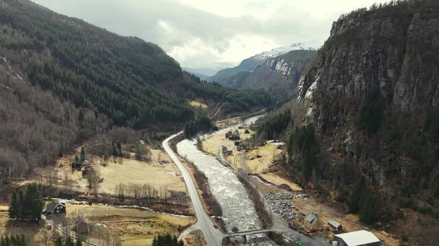 Scenic Aerial Drone Shot Of a river and The mountains in Norway