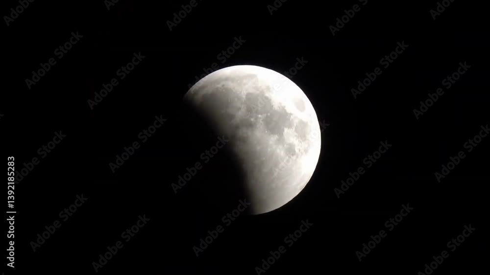 Sticker lunar eclipse in progress against a dark sky.