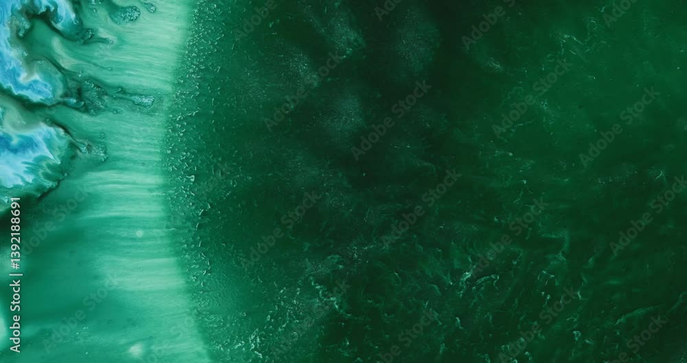 Poster alcohol ink painting creating abstract shapes and patterns with a color palette in shades of turquoi