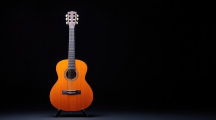 Naklejka premium Acoustic guitar on dark background