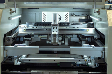 Industrial equipment. Modern production machine. Mechanism of production machine. Manufacturing of...
