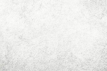 Obraz premium A textured. abstract background featuring a mix of white and gray tones with scattered dark spots. suitable for various design projects and artistic applications