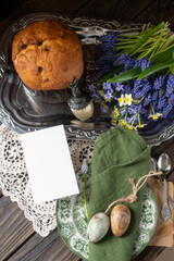 Mockup card Elegant Easter Still Life with Traditional Cake and Decorated Eggs