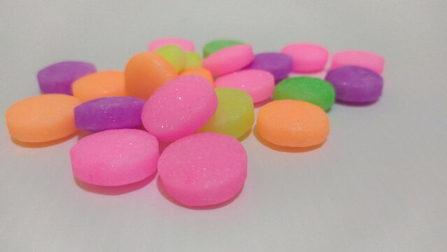 Colorful fumigant naphthalene balls isolated on white background.