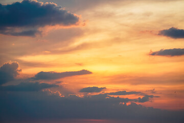 Dramatic sunset colors. Fiery sunset, colorful clouds in the sky. Majestic sunset. orange sunset sky with bright sun