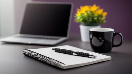 Fototapeta premium Laptop, flowers, and a notebook on a desk. Work from home setup. Simple, clean workspace