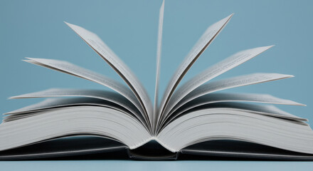 Fototapeta premium Open Book of Knowledge: Turning Pages to Wisdom - Explore Learning, Education, Reading, and Literary Adventures!
