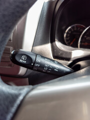 wiper lever on the steering wheel of the car