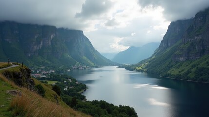 A breathtaking view of a Norwegian landscape at midday, featuring cloudy weather and captured from a panoramic angle.