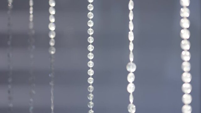 hanging crystals on the wall as decoration in the wedding venue