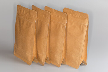 Small sealed paper packing bags with dry products with clasps