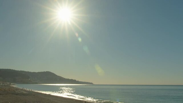 4K French Riviera sunlight shining on a beautiful beach in Nice