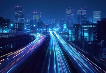 Night-view cityscape with highway light trails from moving cars, glowing skyscrapers