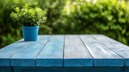 Weathered beach style wood table with blue and gray tones sun bleached summer coastal vibe 