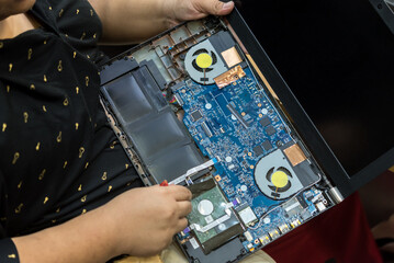 Checking a notebook (laptop) for repair at shop