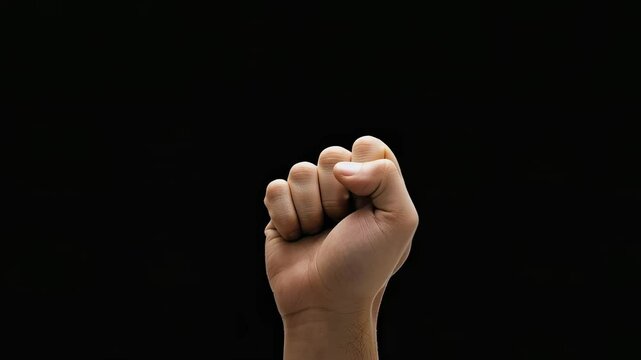 Black background. Hand sign for when you are sure of victory