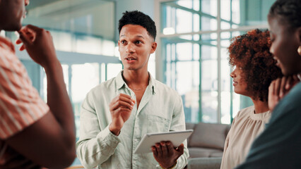Tablet, team talking and business man with ideas, event planning and schedule in creative meeting. Technology, collaboration and group brainstorming in startup office, venue research and design