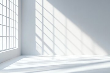 Fototapeta premium Sunlight casts shadows in a white room with large window