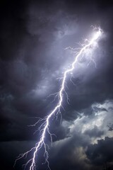 Striking image of a single lightning bolt amidst a brooding, dark thunderstorm - pattern background abstract texture seamless
