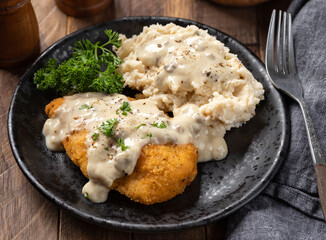 Fried chicken cutlets with mashed potatoes and gravy