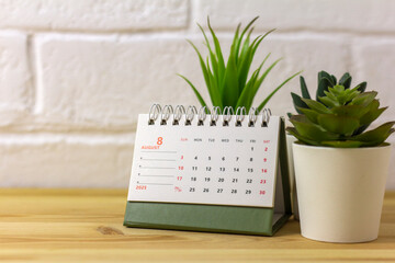 Hello August, August 2025 desk calendar for planning.