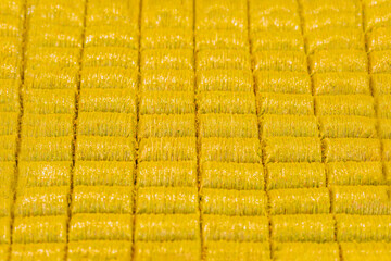 Fototapeta premium Pistachio baklava. Golden baklava pieces aligned in perfect rows, shines with rich color. Food background