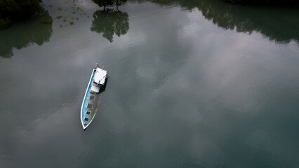 Aerial View of Abandoned Boat in sea