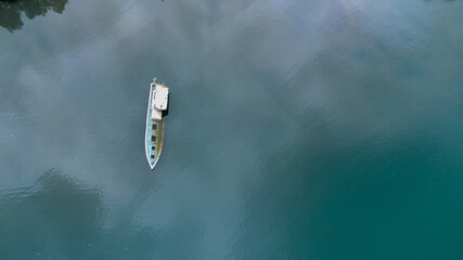 Aerial View of Boat on Calm Water