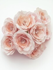 Delicate Rosy Blooms: A close-up of a cluster of soft pink roses with sparkling gem centers evokes feelings of grace and elegance. The tender petals exude a gentle, romantic aura.