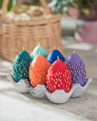 Traditional Maslenitsa: an egg-shaped candle with a willow twig. Selective focus