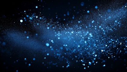 Obraz premium blue particles on a plain black background