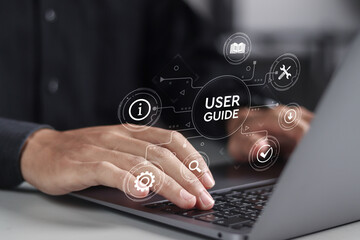 User manual guide concept, Online instruction manual and strategy advice. Person using laptop with...