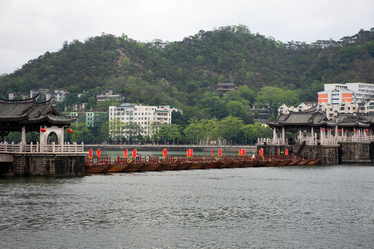 Chinese people and foriegner traveler travel visit and walking on Guangji or Xiangzi bridge crossing Han river at Teochew or Chaozhou city in Guangdong, China