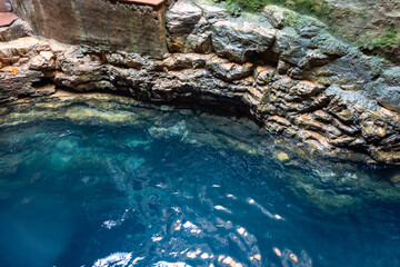 This is naturally occuring blue water in a cave at a location called bhimkund near chhatarpur in madhya pradesh, india.