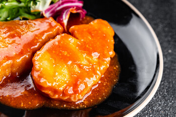 Fish tomato sauce whitefish fillet appetizer dish organic fresh tasty gourmet food background on the table rustic food top view copy space keto paleo diet vegetarian food pescetarian diet