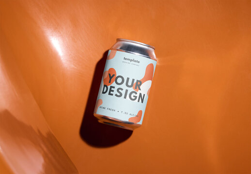 Mockup Of Customized 33Cl Drinks Can On Orange Seat