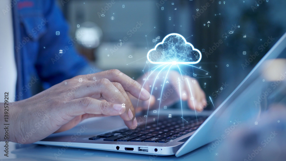 Aufkleber Close-up of hands typing on a laptop with a digital cloud icon overlay, representing cloud computing, data storage, and online connectivity.