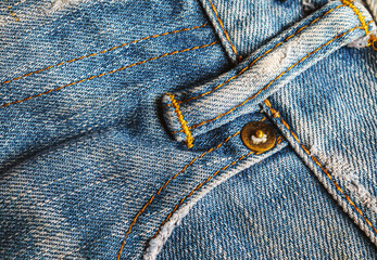 Close-up of details of the surface of denim fabric, Blue denim jeans background