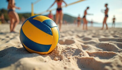 Close-up of volleyball ball on sandy beach with net and players in background. Summer sport, active leisure, beach games, vacation activity. People, friends play match during summer holidays.