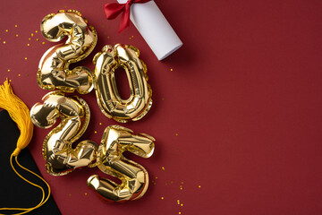 Festive arrangement featuring golden number balloons displaying 2025, a graduation cap, and...