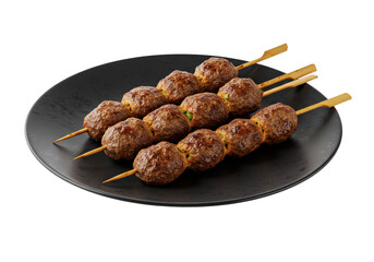 Grilled meat skewers served on a black plate, showcasing delicious barbecue preparation