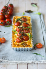 ppetizing chicken and tomato quiche with melted cheese on a flaky crust. Perfect for food blogs, recipes, and ads. Top view, close-up, and sliced shots. Natural lighting, rustic style, selective focus